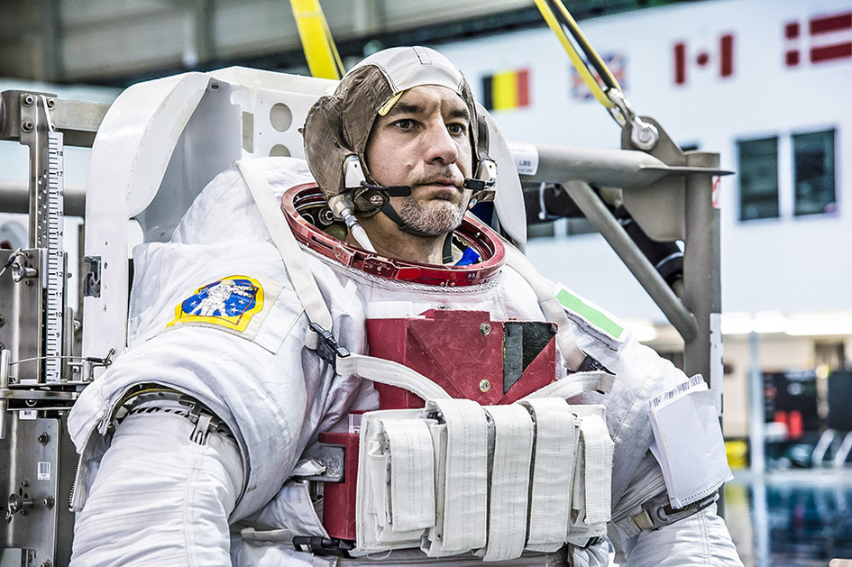 ESA_astronaut_Luca_Parmitano_suiting_up_for_EVA_training_fullwidth